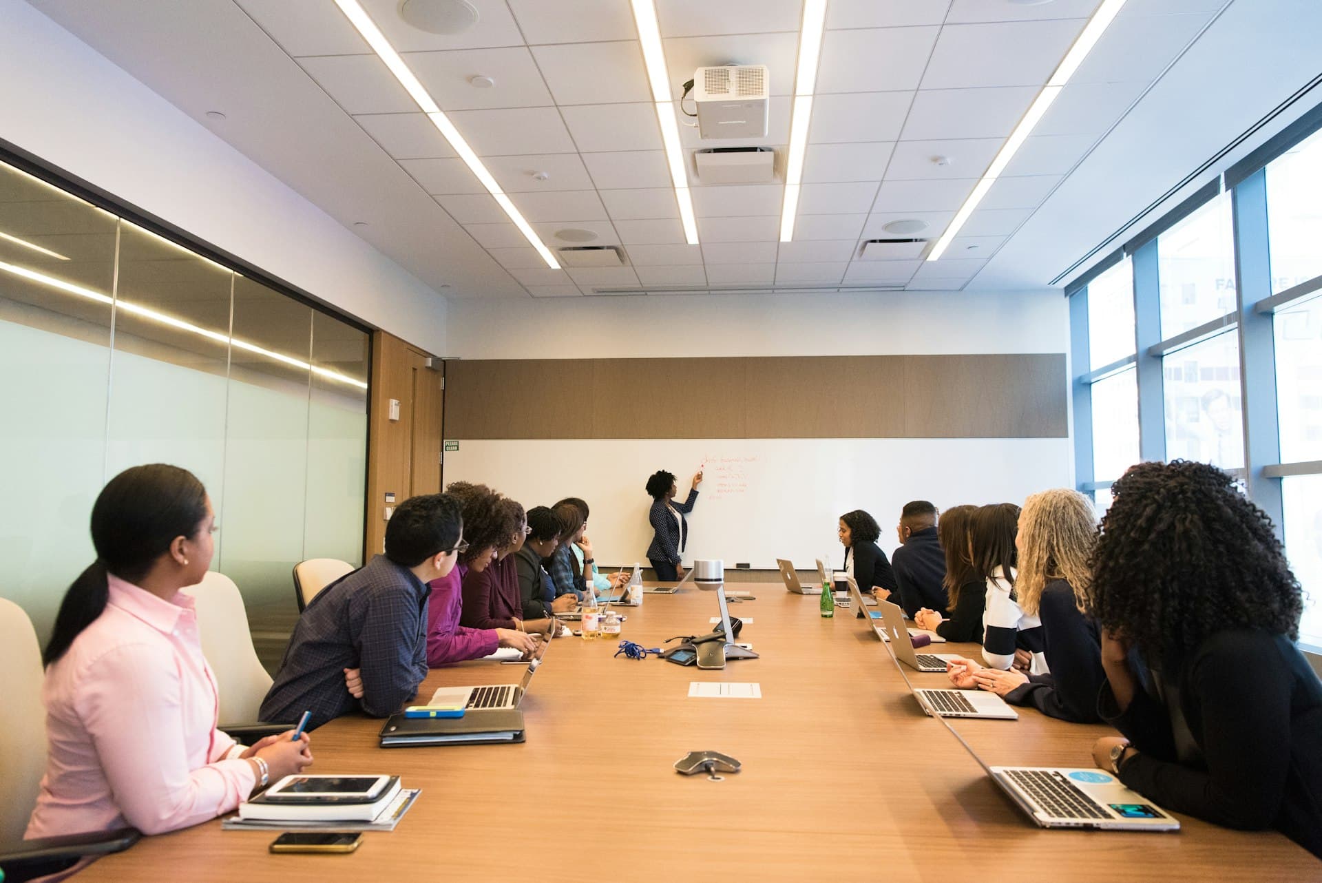 Diverse team collaborating in a modern conference room
